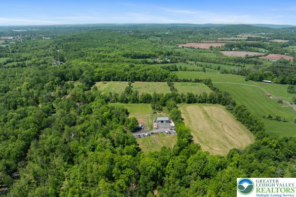 325 Pullen Station Road Quakertown, PA 18951 - Photo 18 of 23 an aerial view of residential houses with outdoor space and trees
