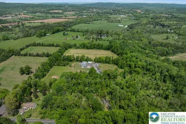 an aerial view of a city with lots of residential buildings