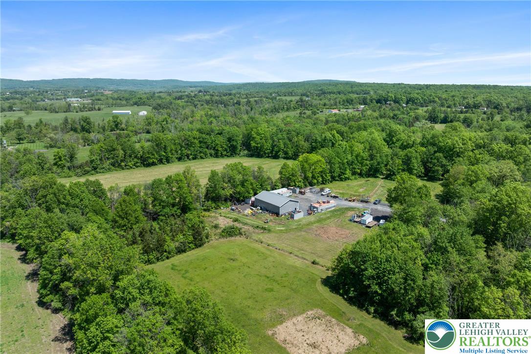 325 Pullen Station Road Quakertown, PA 18951 - Photo 4 of 23 a view of a city with lush green forest