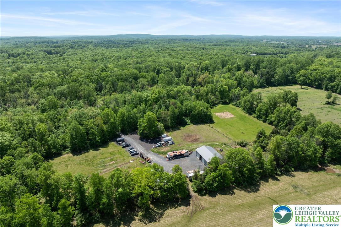 325 Pullen Station Road Quakertown, PA 18951 - Photo 6 of 23 a view of a city with lush green forest