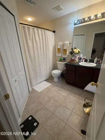 a room with furniture and a mirror