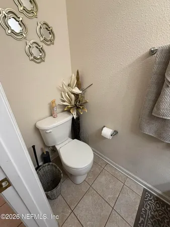 a bathroom with a toilet and a sink