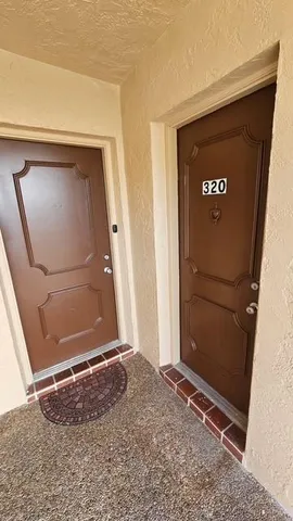 a bathroom with a mirror and a shower