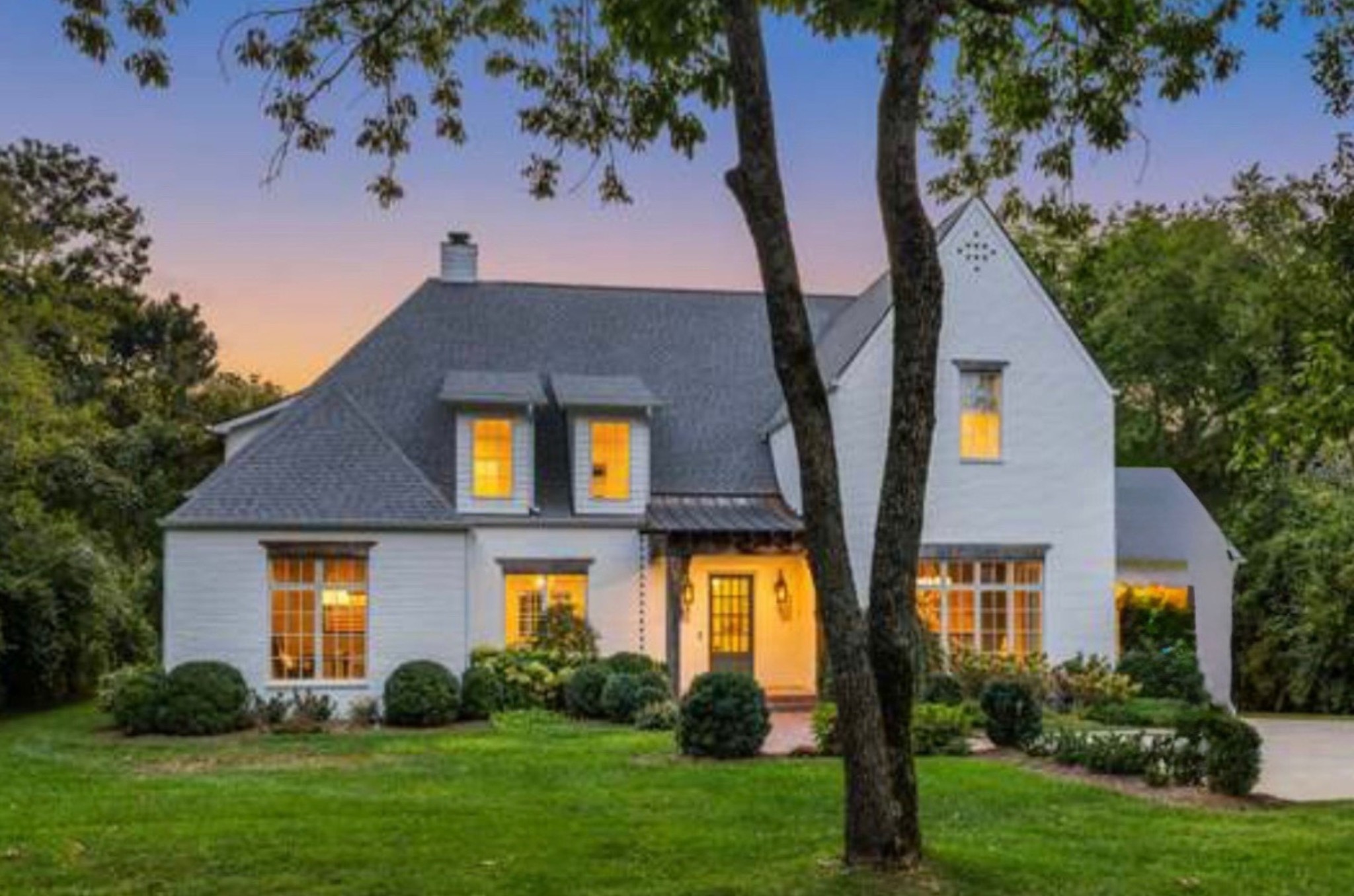 6006 Eastmans Way Brentwood, TN 37027 - Photo 1 of 12 a front view of a house with garden