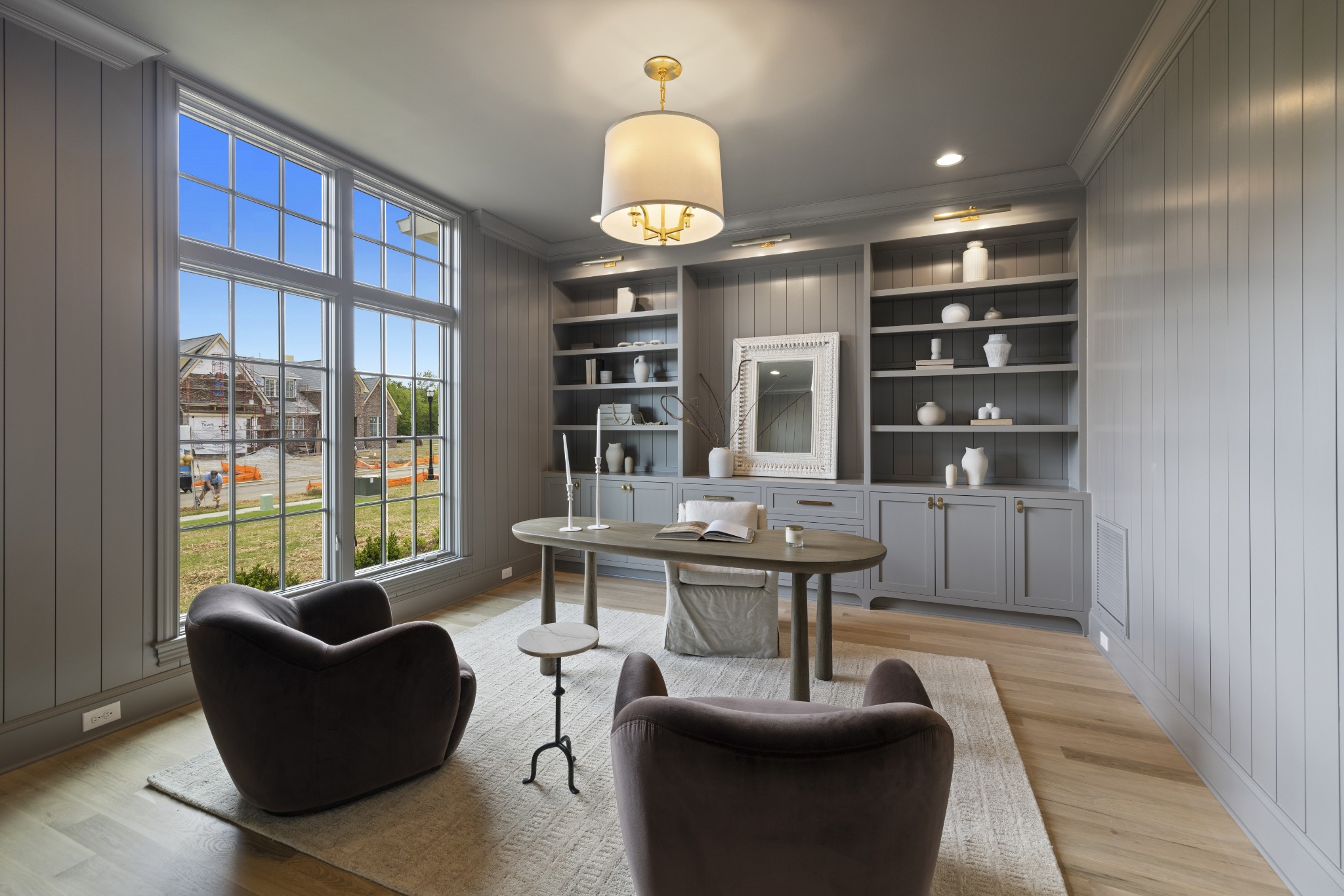 6006 Eastmans Way Brentwood, TN 37027 - Photo 11 of 12 a living room with furniture a chandelier and a table