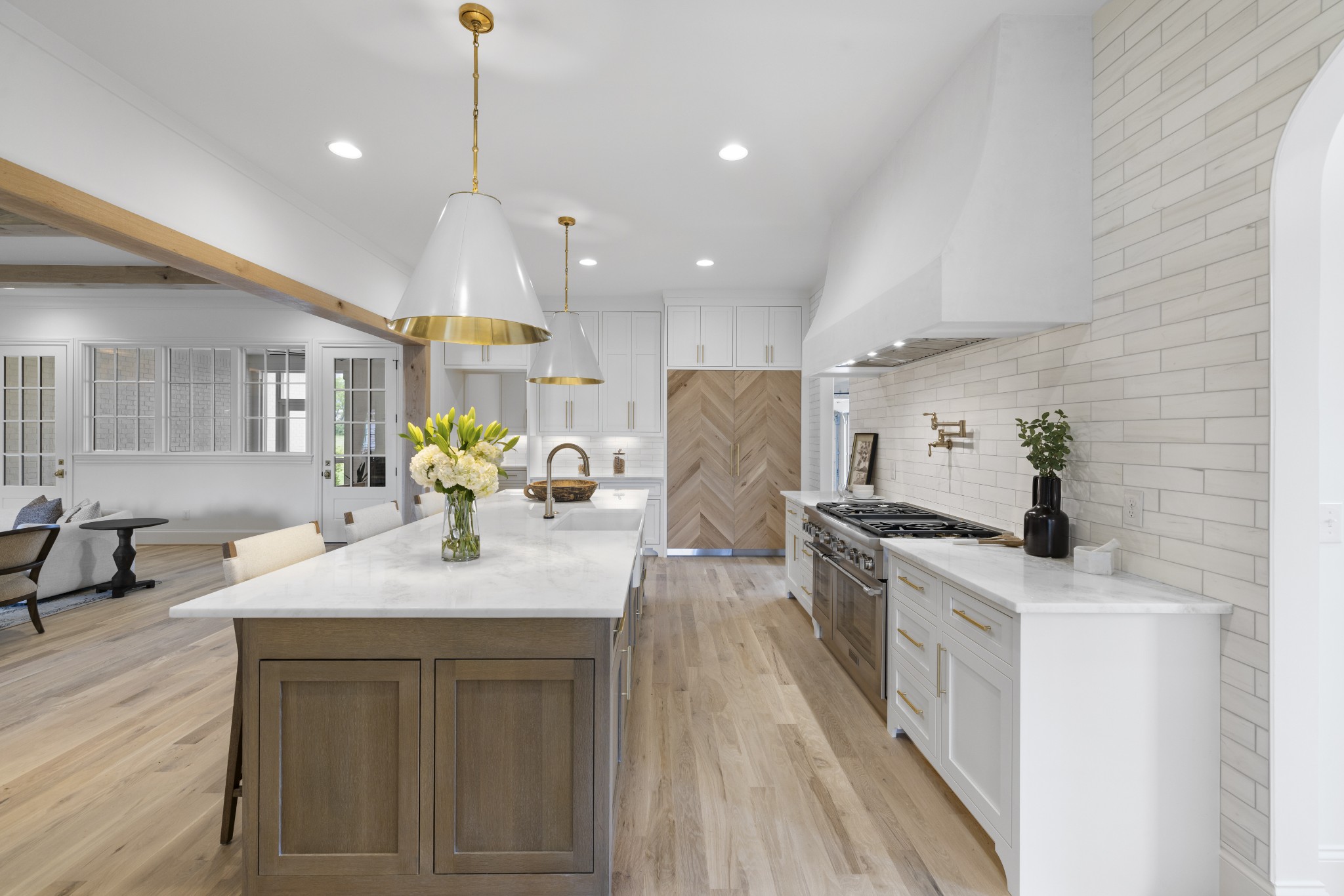 6006 Eastmans Way Brentwood, TN 37027 - Photo 10 of 12 a kitchen with stainless steel appliances kitchen island granite countertop a sink stove and refrigerator