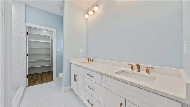 a bathroom with a sink and mirror