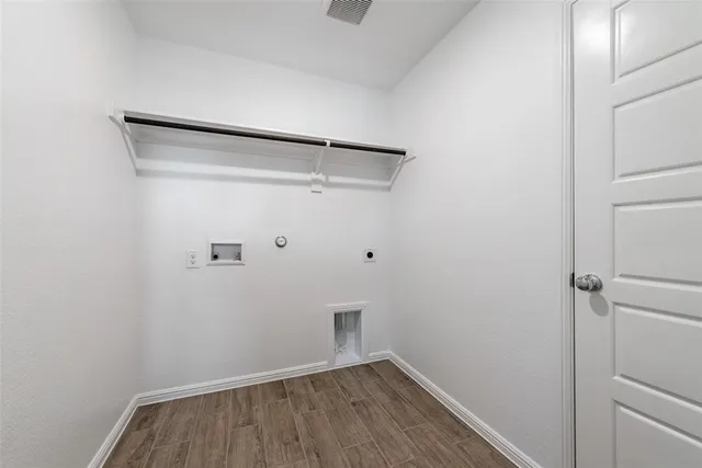 a view of small space with wooden floor