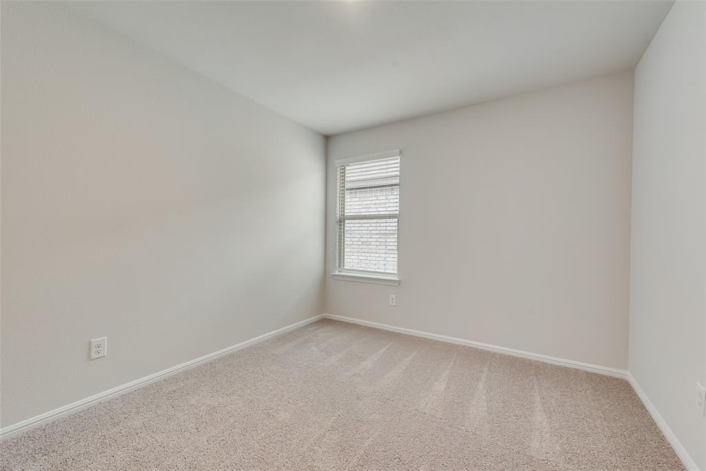 1137 Catalan Trail Mesquite, TX 75149 - Photo 20 of 22 a view of an empty room with a window