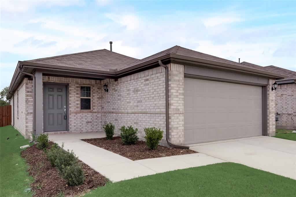 1137 Catalan Trail Mesquite, TX 75149 - Photo 2 of 22 a front view of a house with a yard