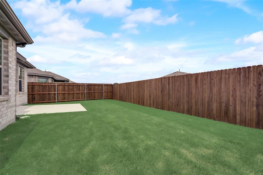 1137 Catalan Trail Mesquite, TX 75149 - Photo 21 of 22 a view of yard with wooden fence
