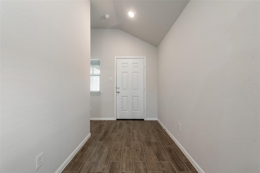 1137 Catalan Trail Mesquite, TX 75149 - Photo 3 of 22 a view of a hallway with wooden floor