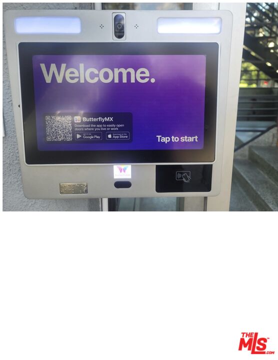 435 South Palm Drive, Unit 5 Beverly Hills, CA 90212 - Photo 12 of 13 a picture of a bench in a white building