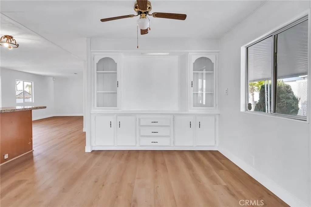 17700 Avalon, Unit 267 Carson, CA 90745 - Photo 12 of 50 wooden floor in an empty room with a window