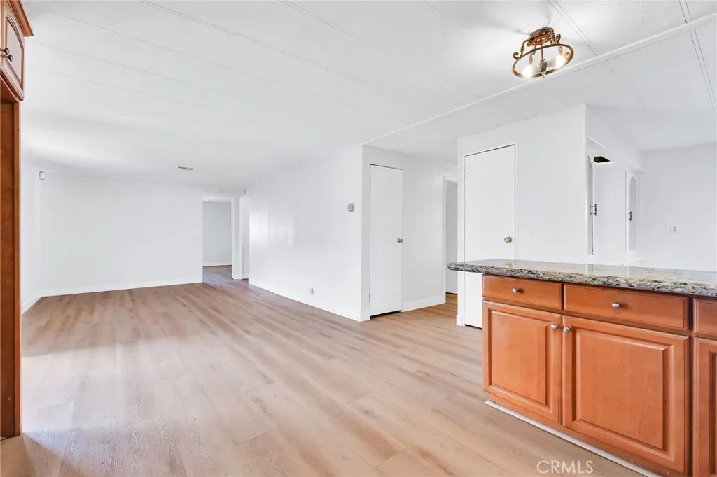 17700 Avalon, Unit 267 Carson, CA 90745 - Photo 19 of 50 a view of a kitchen with wooden floor