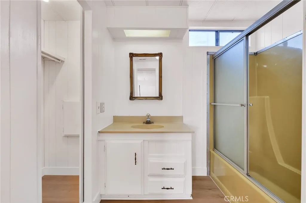 17700 Avalon, Unit 267 Carson, CA 90745 - Photo 32 of 50 a bathroom with a sink and a mirror