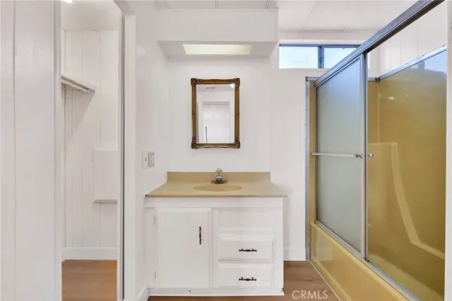 a bathroom with a sink and a bathtub