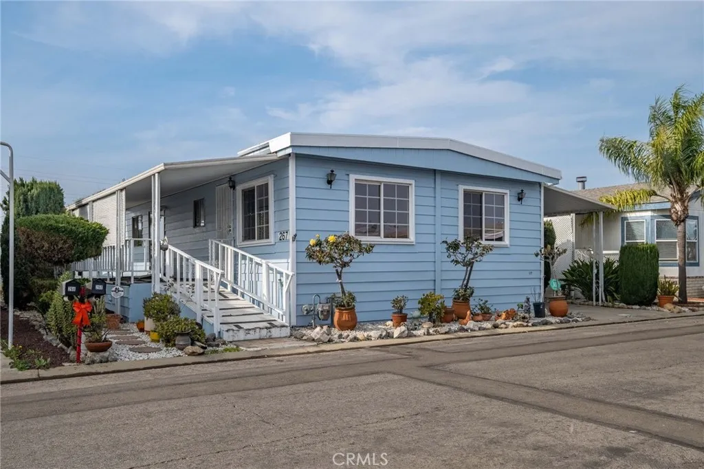 17700 Avalon, Unit 267 Carson, CA 90745 - Photo 49 of 50 a front view of a house with a yard