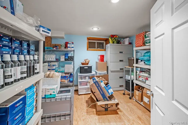 a room with furniture and a book shelf