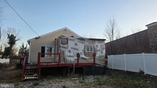 a house view with a backyard space