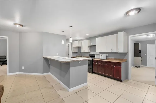 a large kitchen with a cabinets and counter space