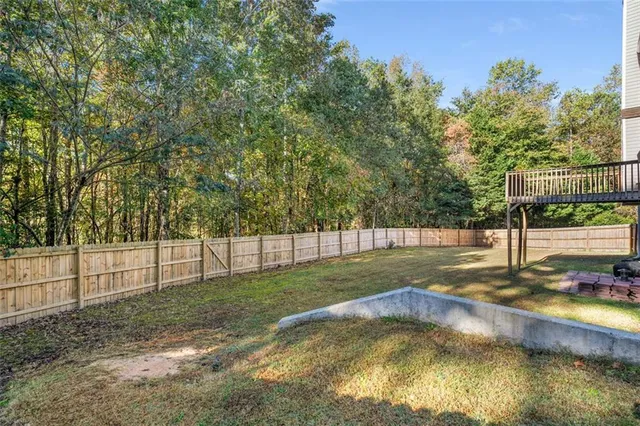 an aerial view of a house with a garden