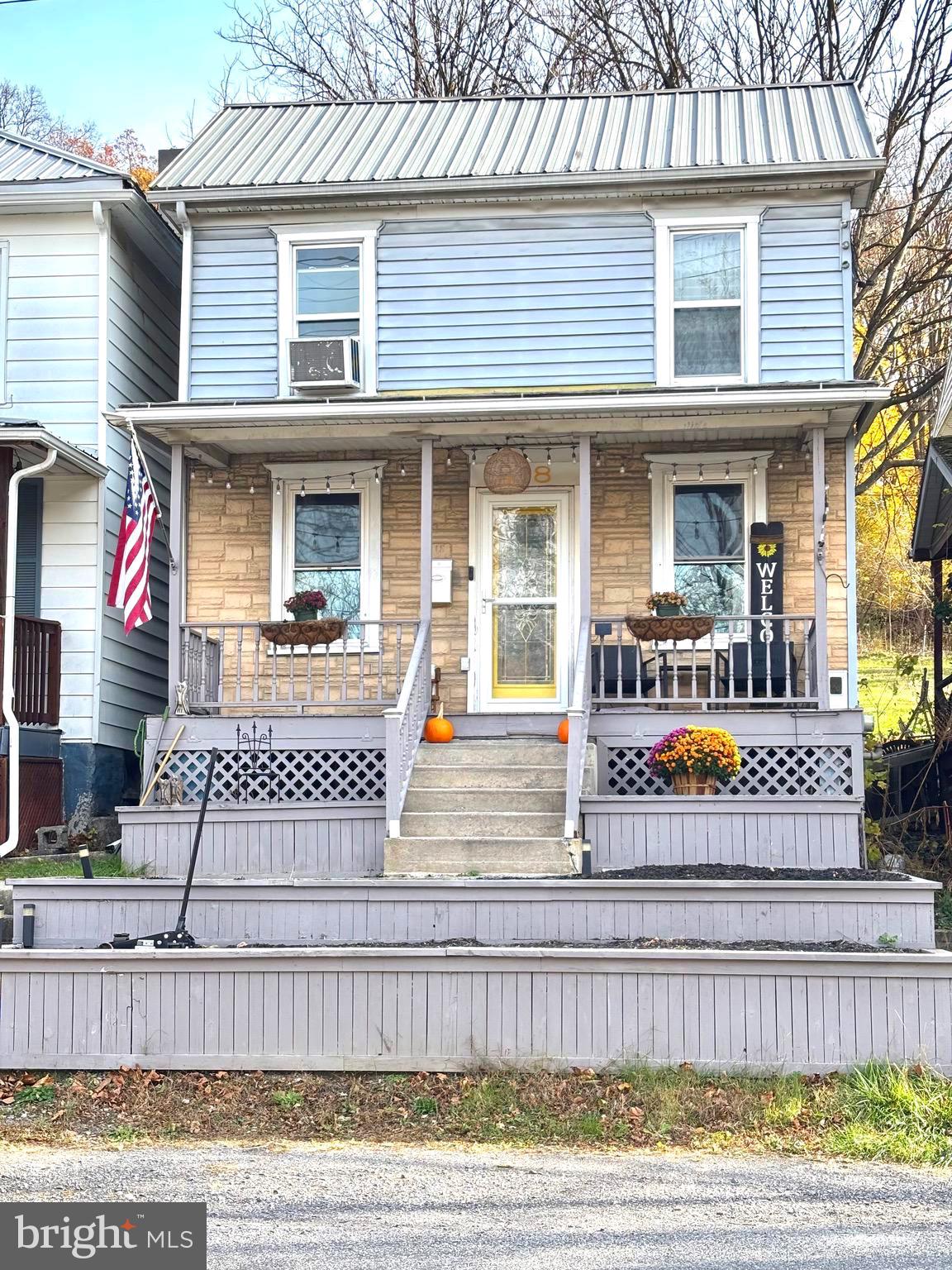 a front view of a house with lots of counter and kitchen