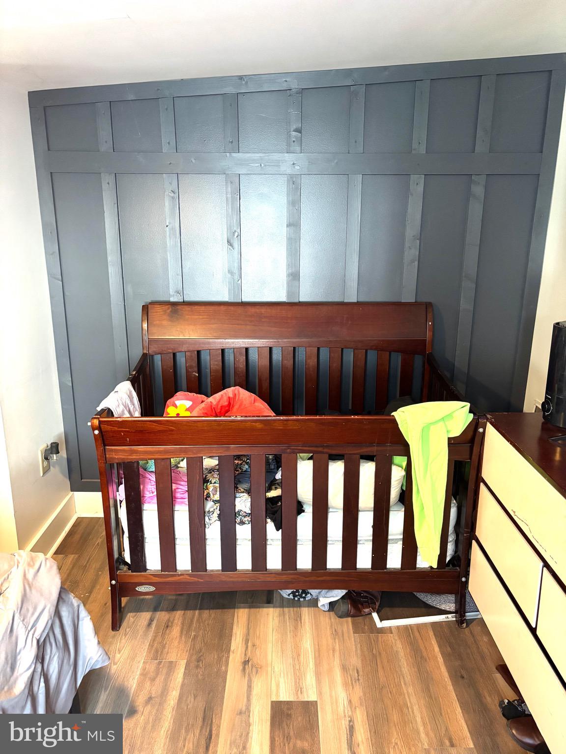 418 Bridge Street Lewistown, PA 17044 - Photo 14 of 23 a bedroom with furniture and wooden floor