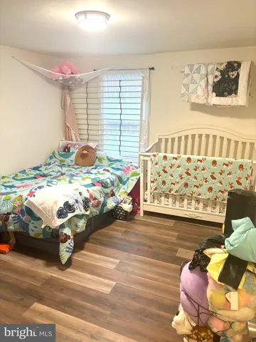 a living room with baby toys