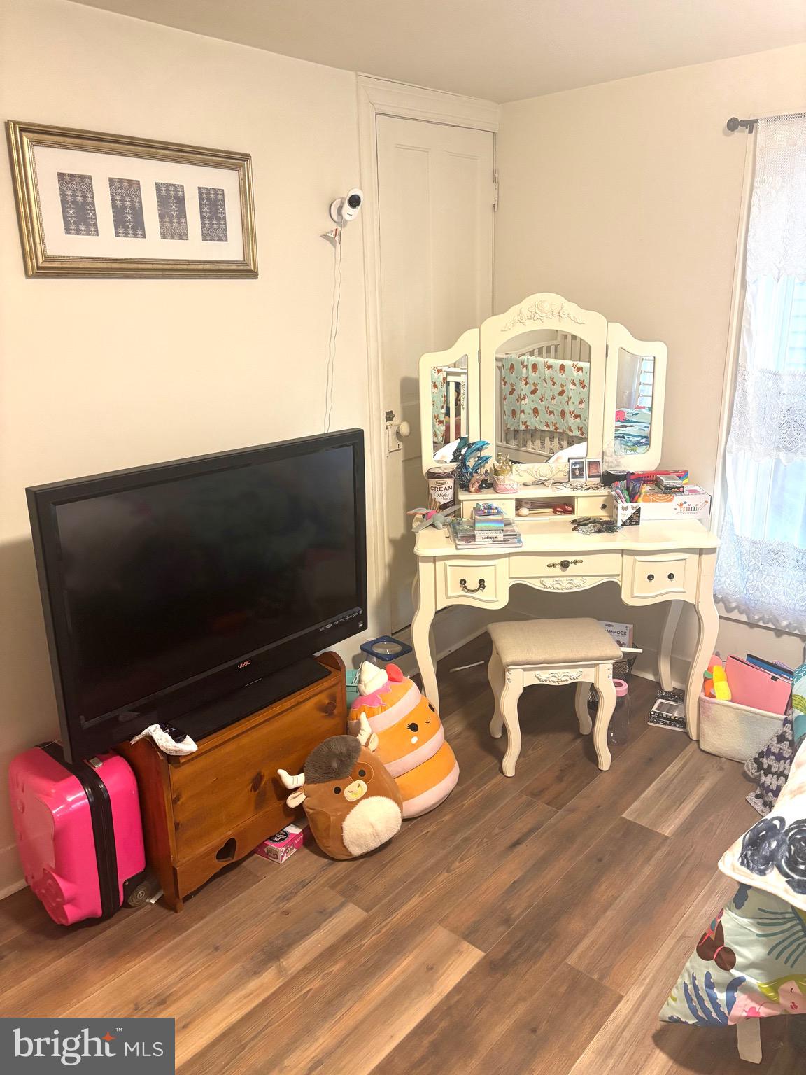 418 Bridge Street Lewistown, PA 17044 - Photo 17 of 23 a living room with a flat screen tv and a couch