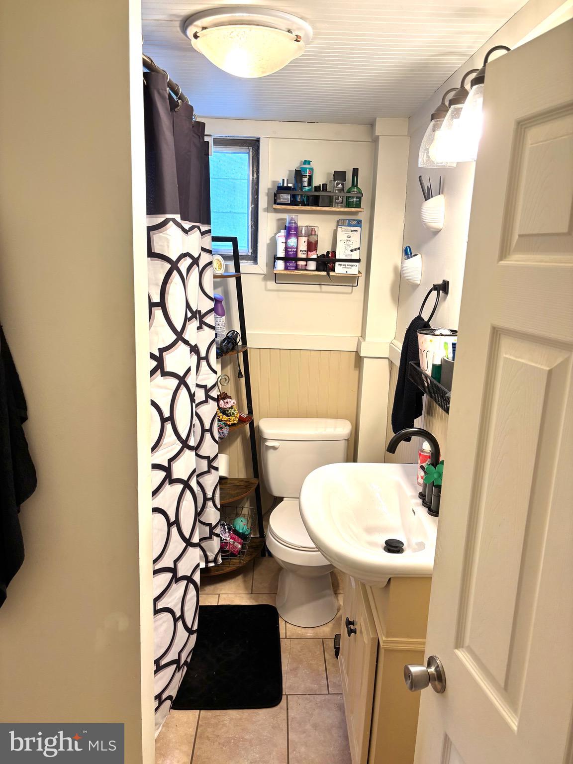 418 Bridge Street Lewistown, PA 17044 - Photo 19 of 23 a bathroom with a sink toilet and shower