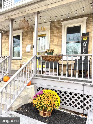 a front view of a building with glass windows