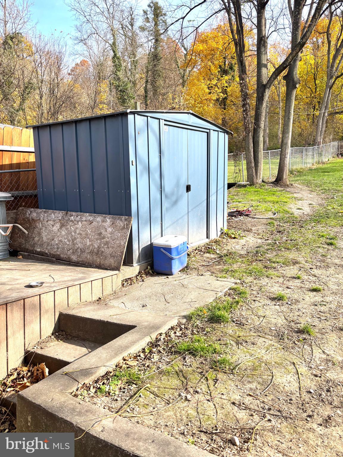 418 Bridge Street Lewistown, PA 17044 - Photo 22 of 23 a view of a backyard with wooden fence