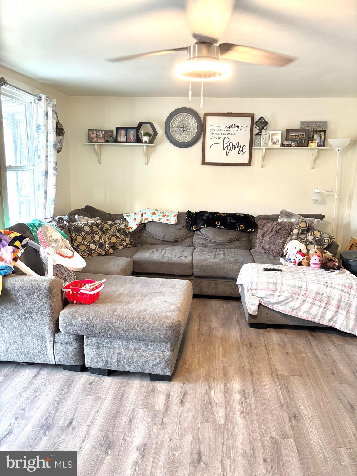 418 Bridge Street Lewistown, PA 17044 - Photo 3 of 23 a living room with furniture and a couch