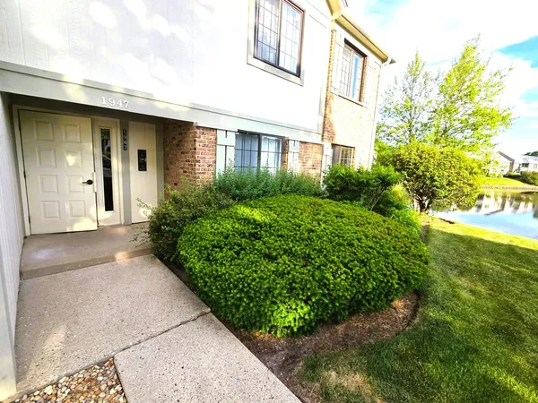 a view of a back yard of the house