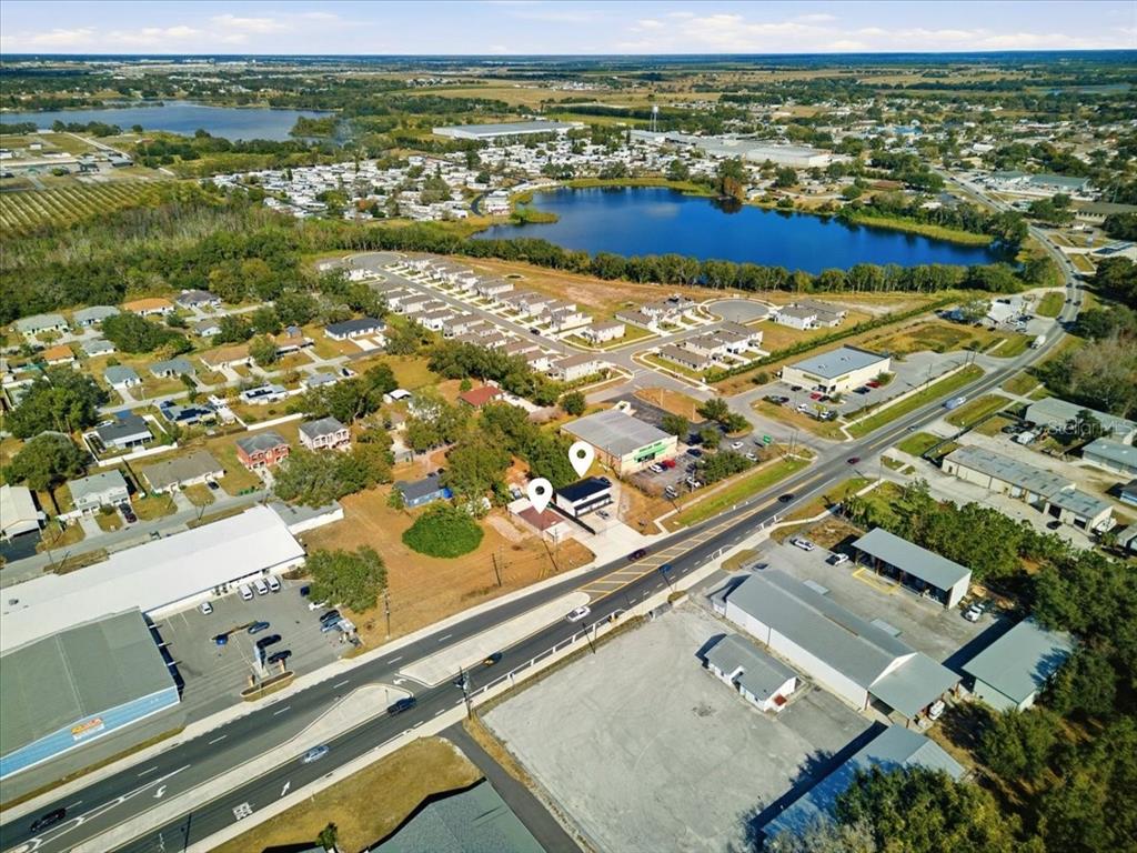 608 Dundee Road Dundee, FL 33838 - Photo 3 of 77 an aerial view of residential houses with outdoor space