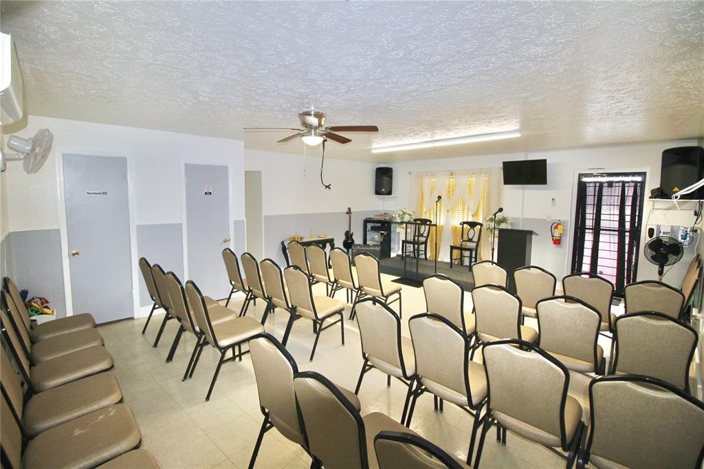 608 Dundee Road Dundee, FL 33838 - Photo 38 of 77 a living room with furniture kitchen view and a chandelier