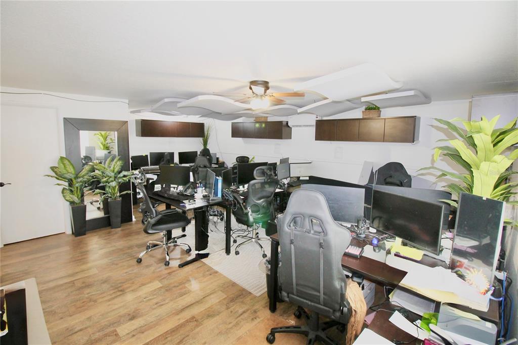 608 Dundee Road Dundee, FL 33838 - Photo 58 of 77 a workspace with furniture and a potted plant