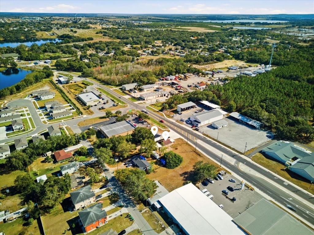 608 Dundee Road Dundee, FL 33838 - Photo 77 of 77 an aerial view of a residential houses with outdoor space