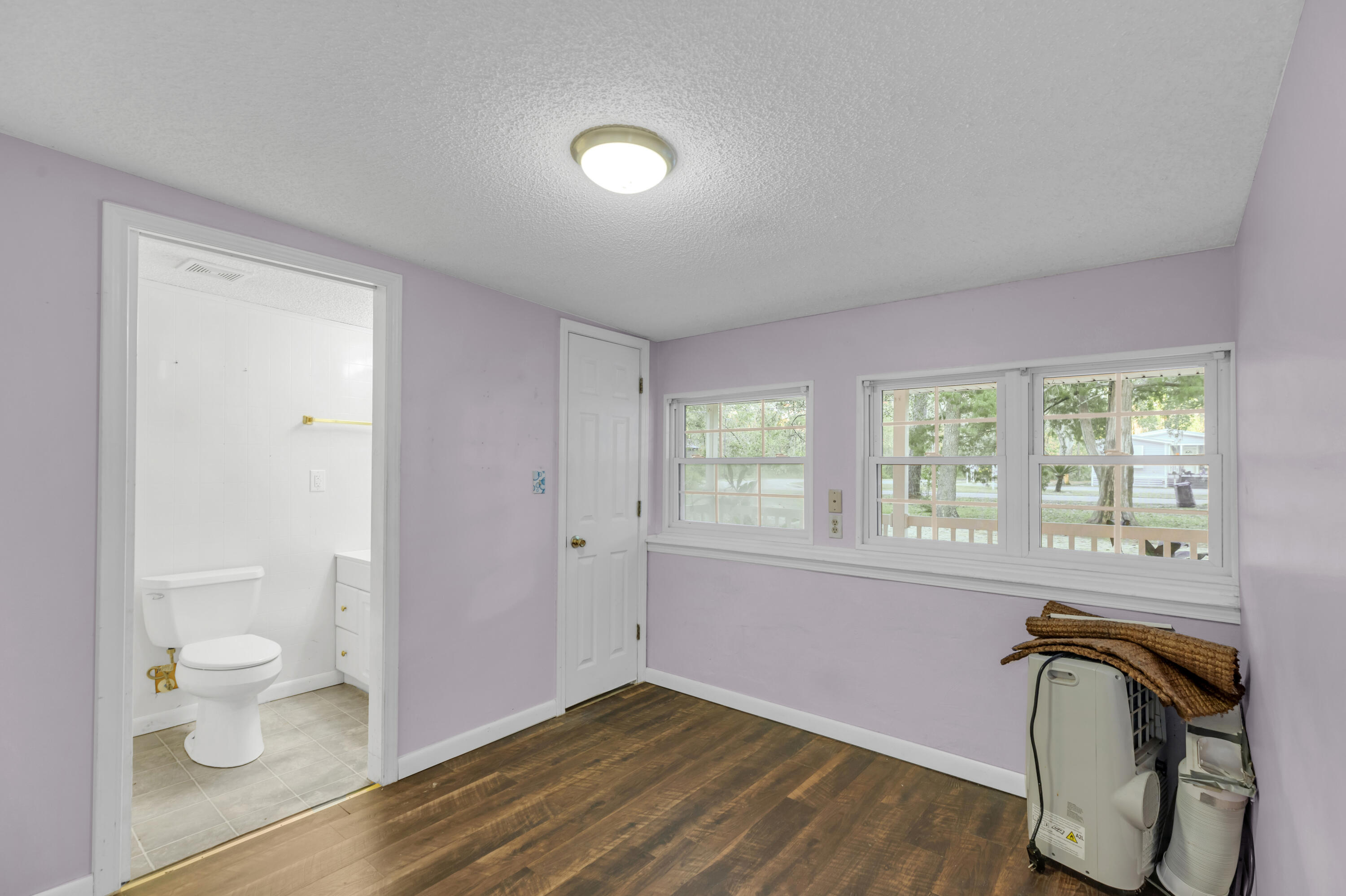 810 McDaniels Fishcamp Road Freeport, FL 32439 - Photo 21 of 33 810 primary bedroom with ensuite