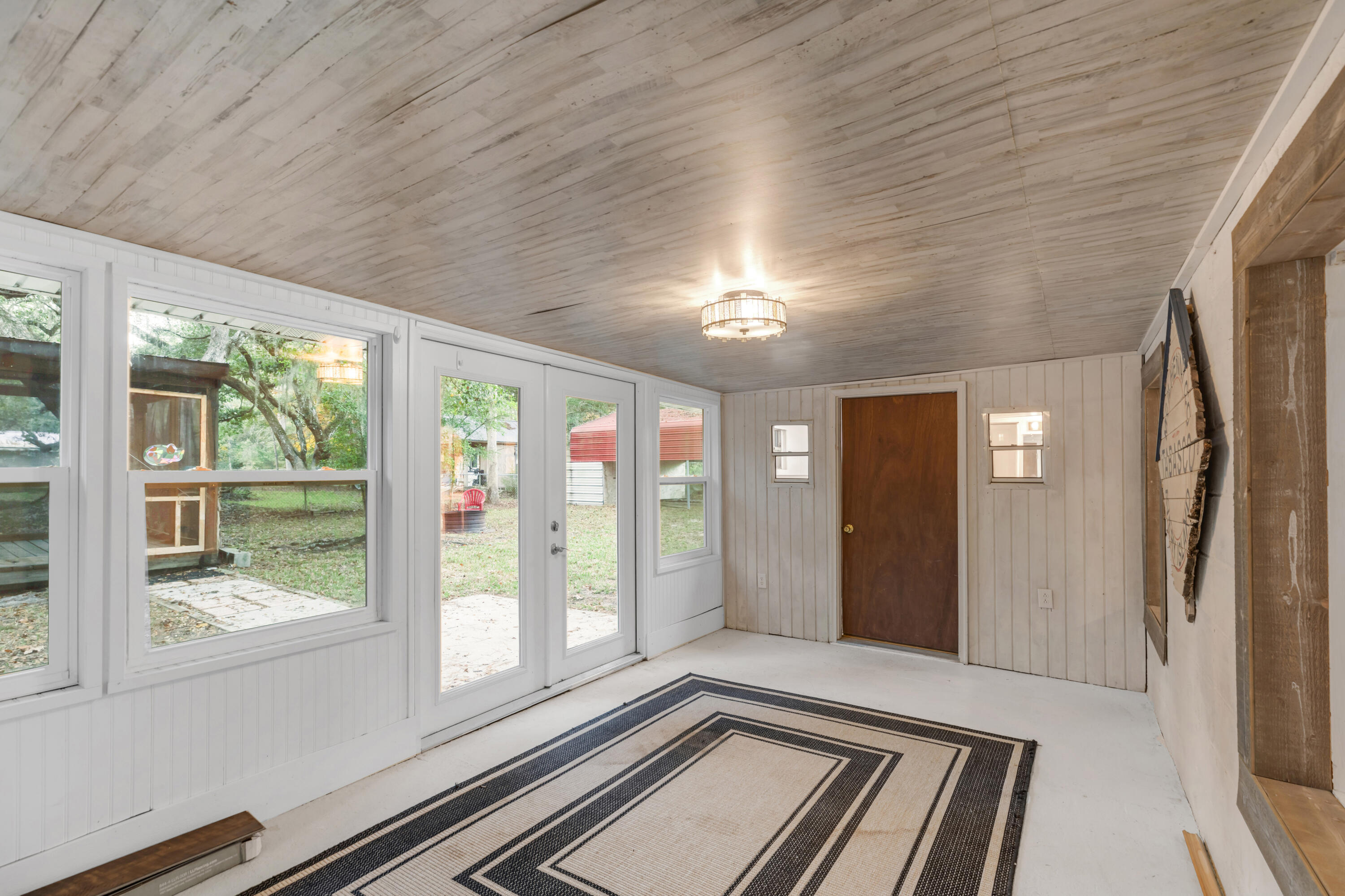 810 McDaniels Fishcamp Road Freeport, FL 32439 - Photo 28 of 33 810 florida room another view 1
