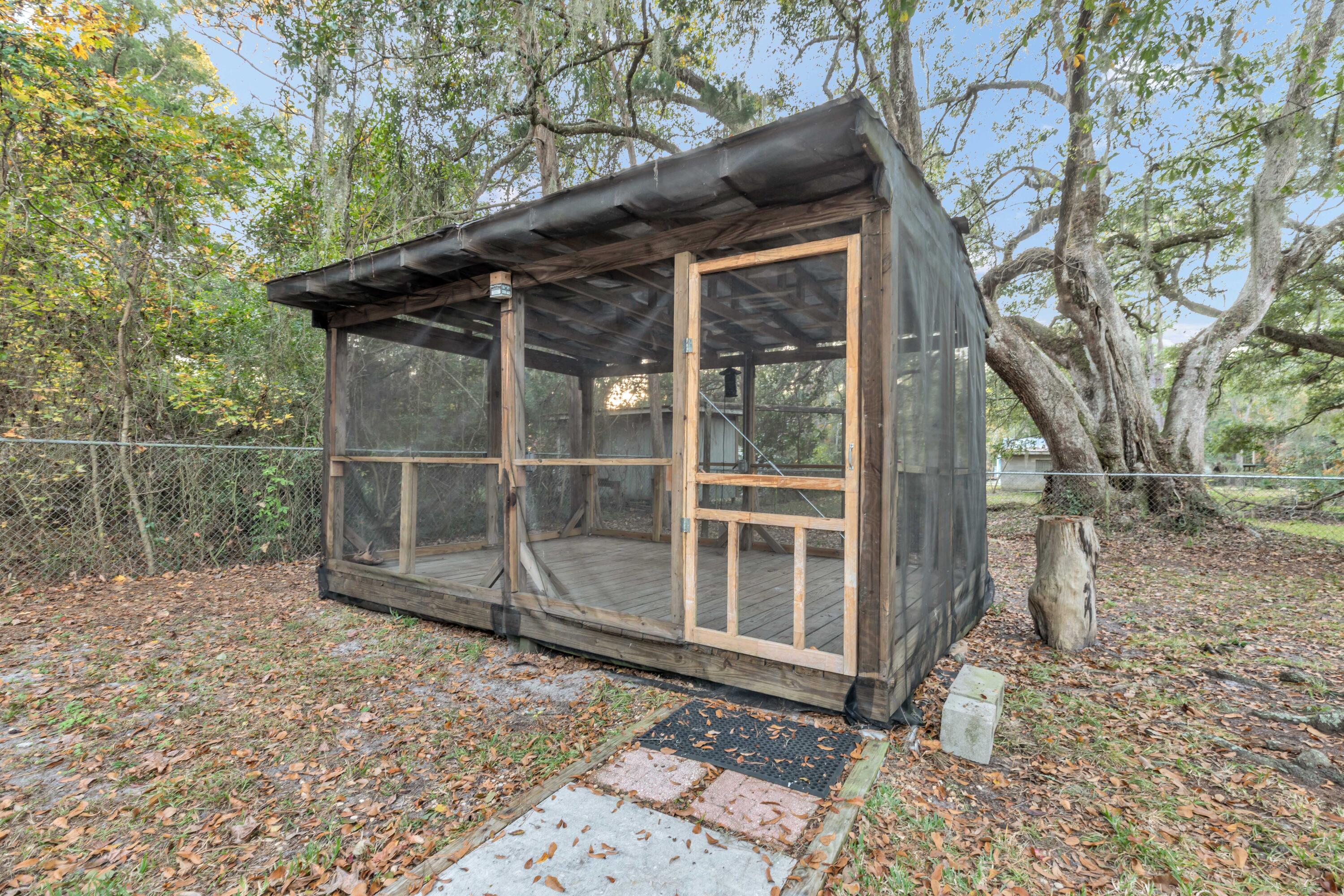 810 McDaniels Fishcamp Road Freeport, FL 32439 - Photo 8 of 33 810 back yard screened porch