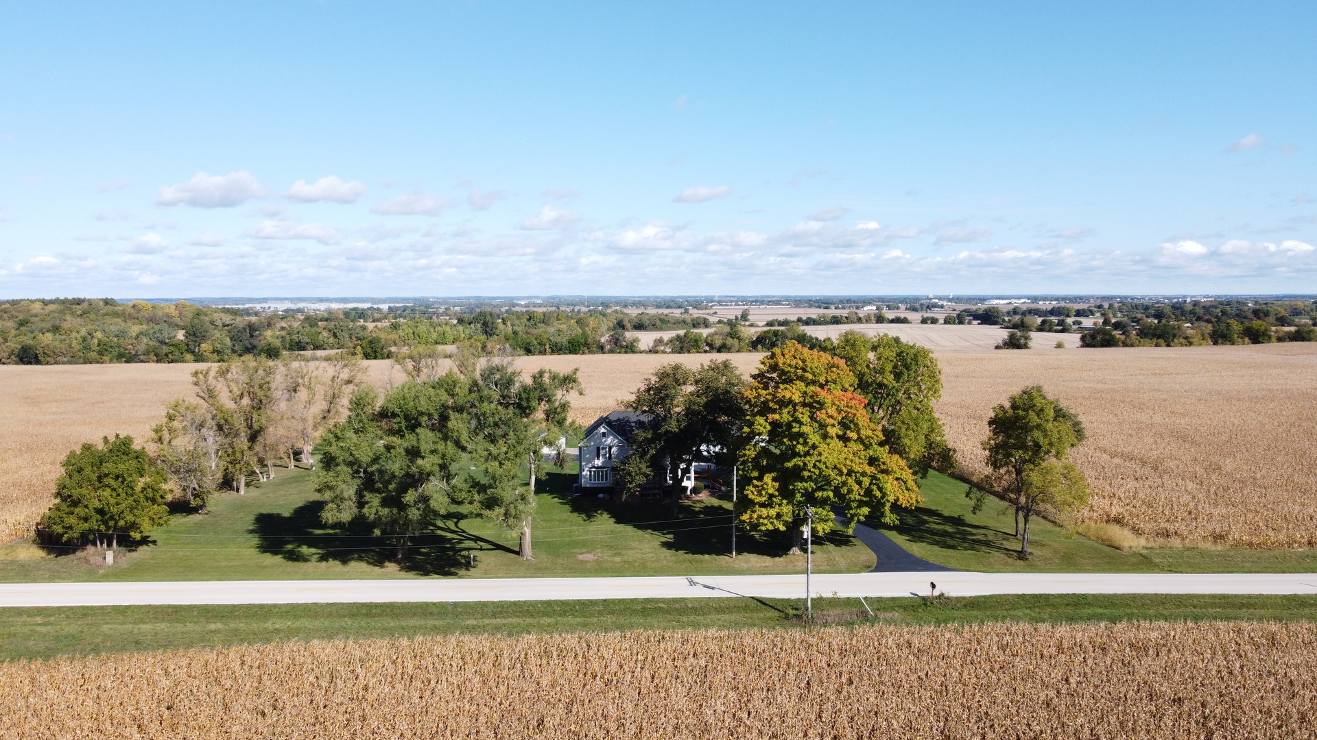 4518 Bates Road Belvidere, IL 61008 - Photo 3 of 41 a view of a lake with a mountain