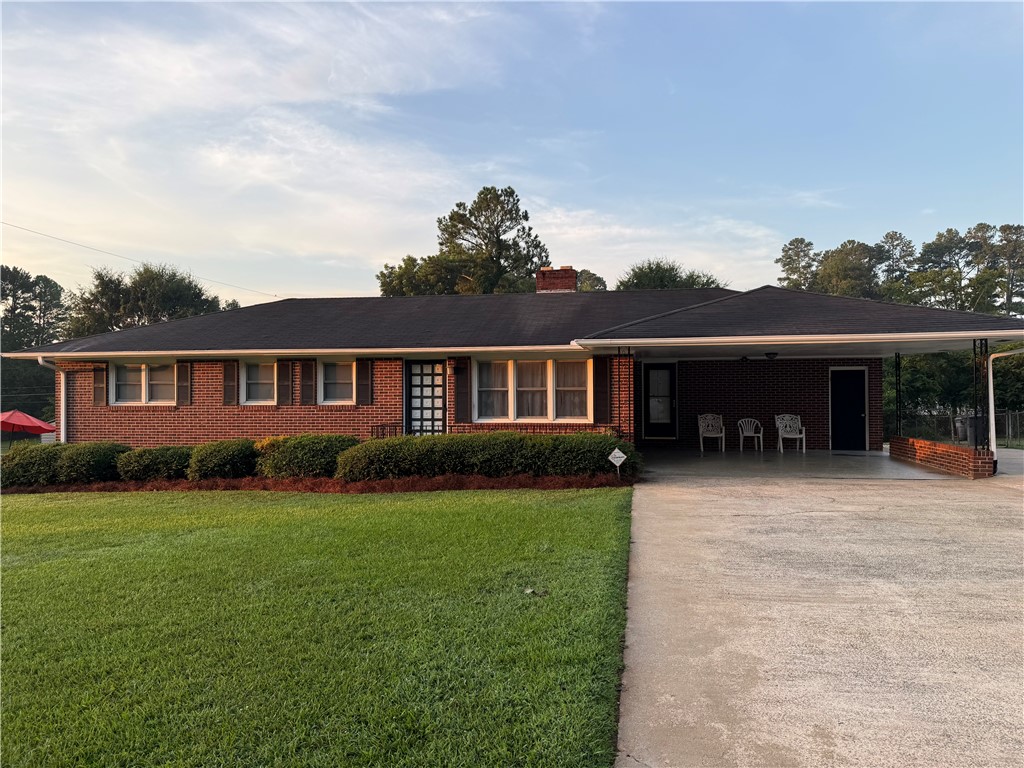 2008 Bolt Drive Anderson, SC 29621 - Photo 1 of 23 Classic brick architecture anchors this single-level home fronted by a manicured lawn.