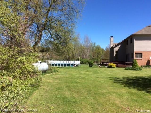 8151 Eagle Road Davisburg, MI 48350 - Photo 17 of 77 back side.jpg