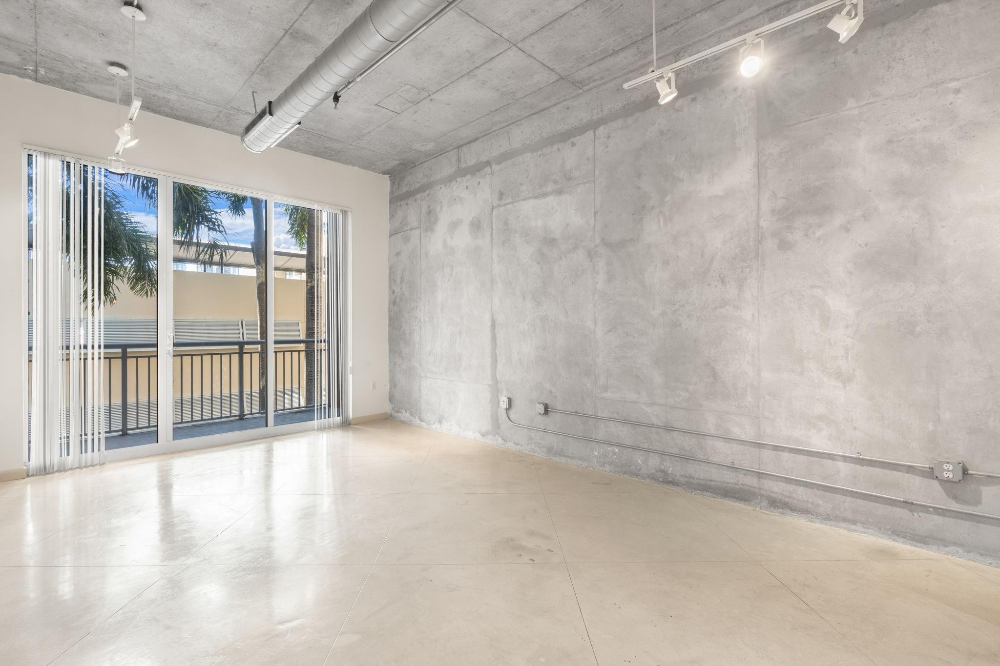 2001 Biscayne Boulevard, Unit 2303 Miami, FL 33137 - Photo 12 of 36 a view of an empty room with a window