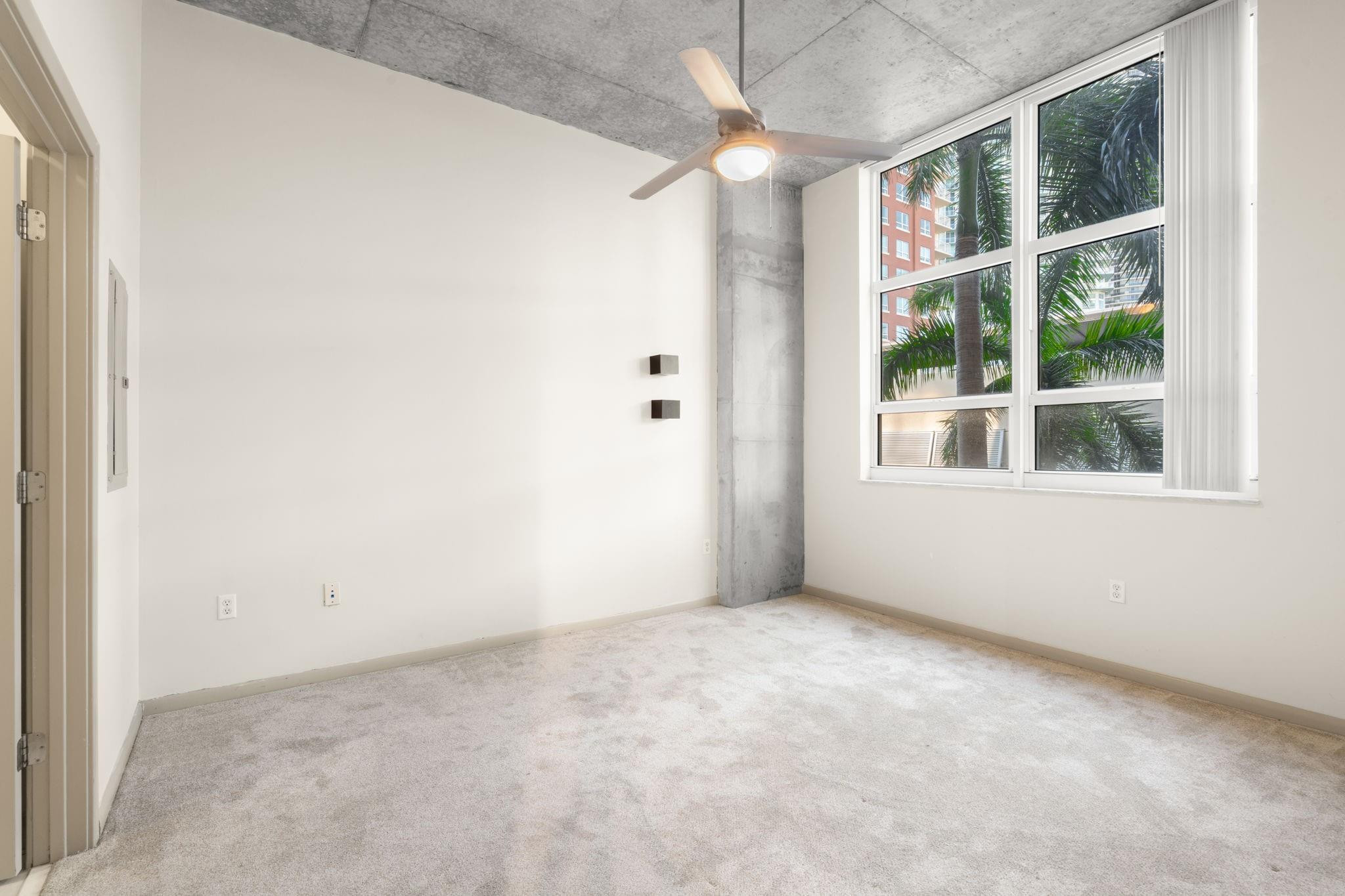 2001 Biscayne Boulevard, Unit 2303 Miami, FL 33137 - Photo 16 of 36 a view of empty room with windows