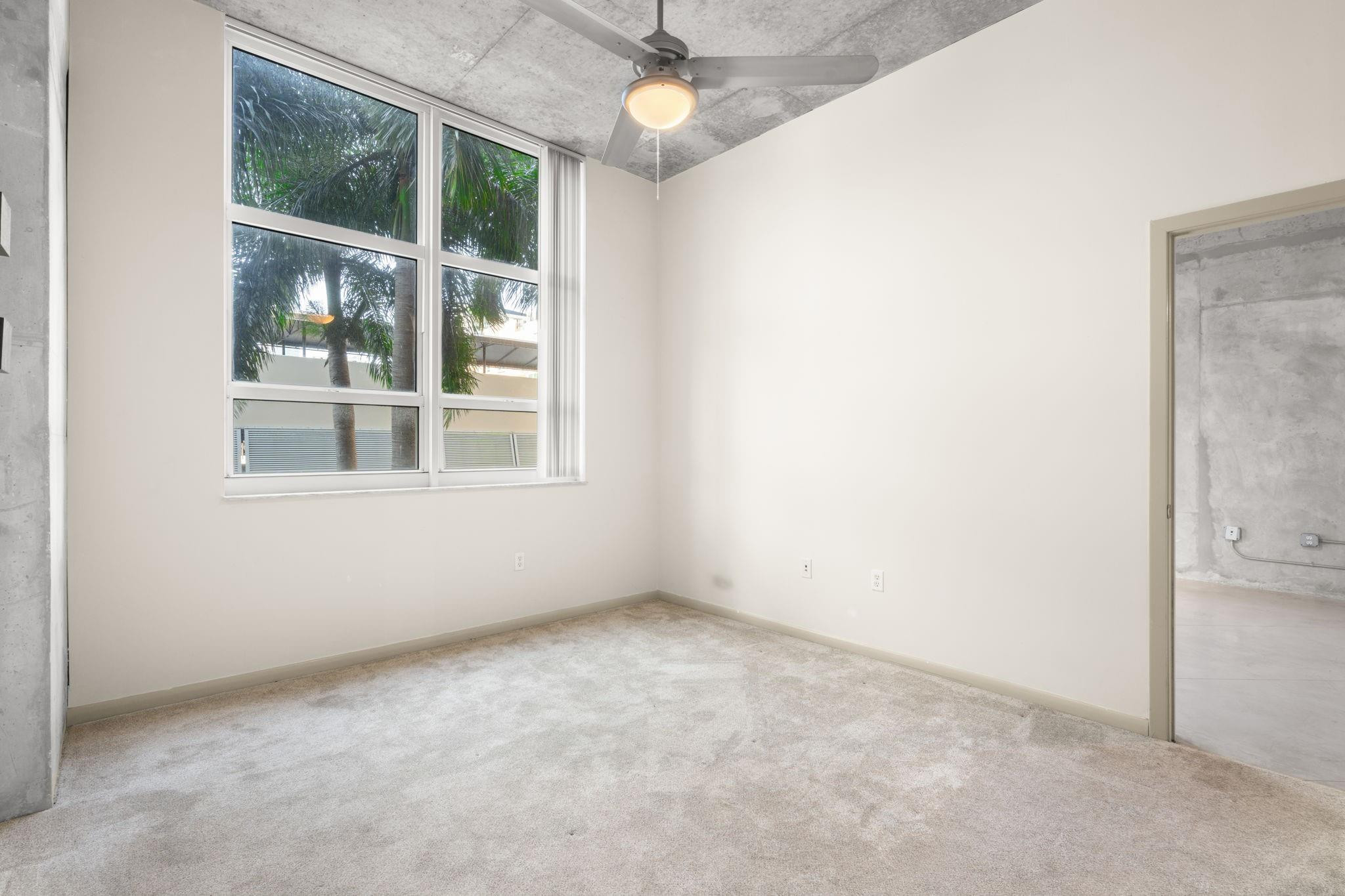 2001 Biscayne Boulevard, Unit 2303 Miami, FL 33137 - Photo 17 of 36 an empty room with a window