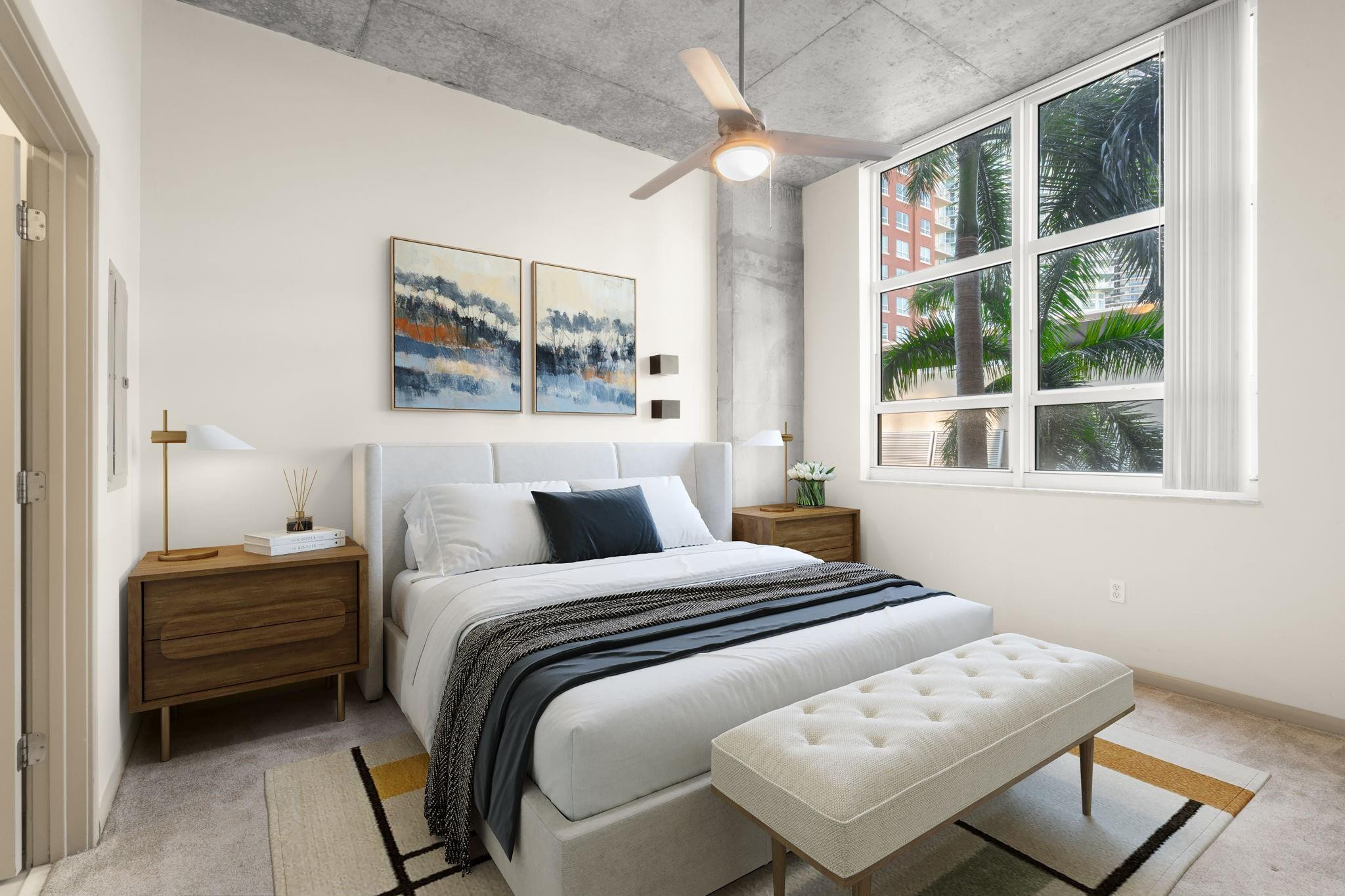 2001 Biscayne Boulevard, Unit 2303 Miami, FL 33137 - Photo 18 of 36 a bedroom with a bed and a window