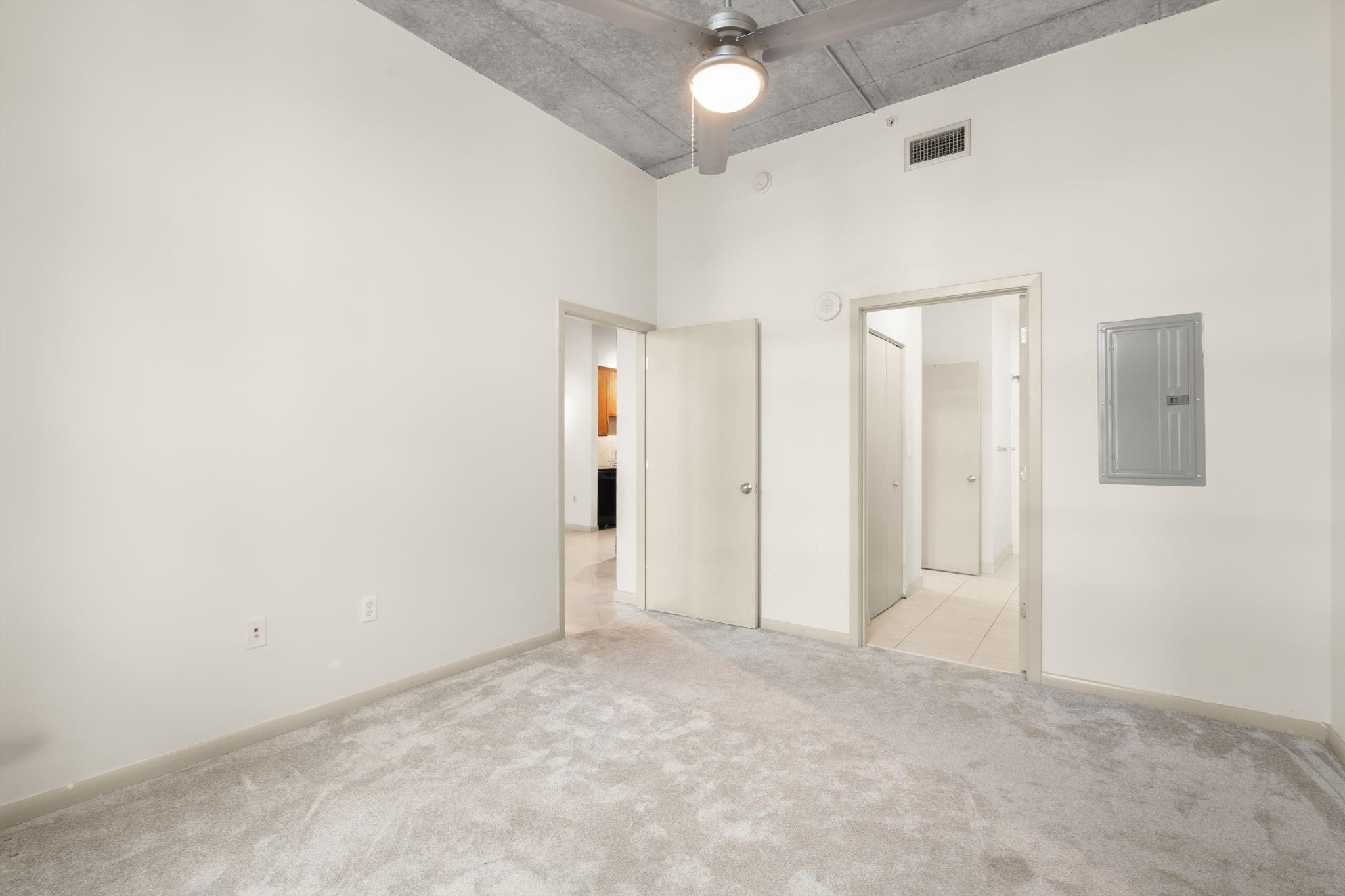 2001 Biscayne Boulevard, Unit 2303 Miami, FL 33137 - Photo 22 of 36 an empty room with closet area